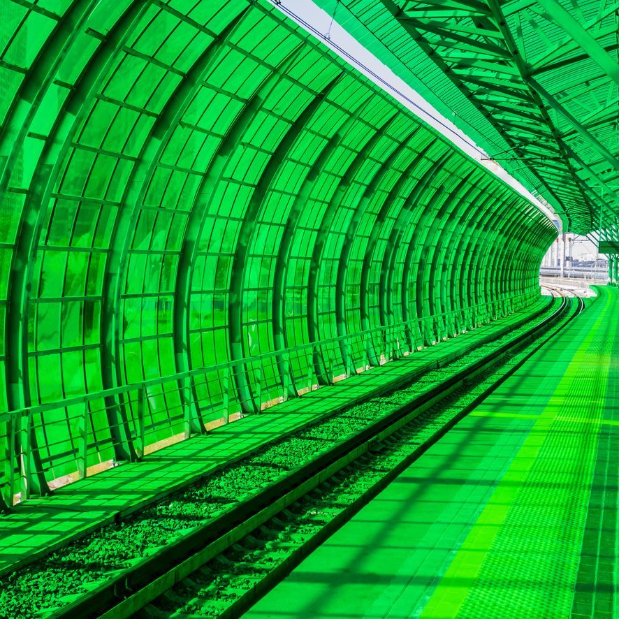 Green-walled platform in modern metro station, Moscow, Russia