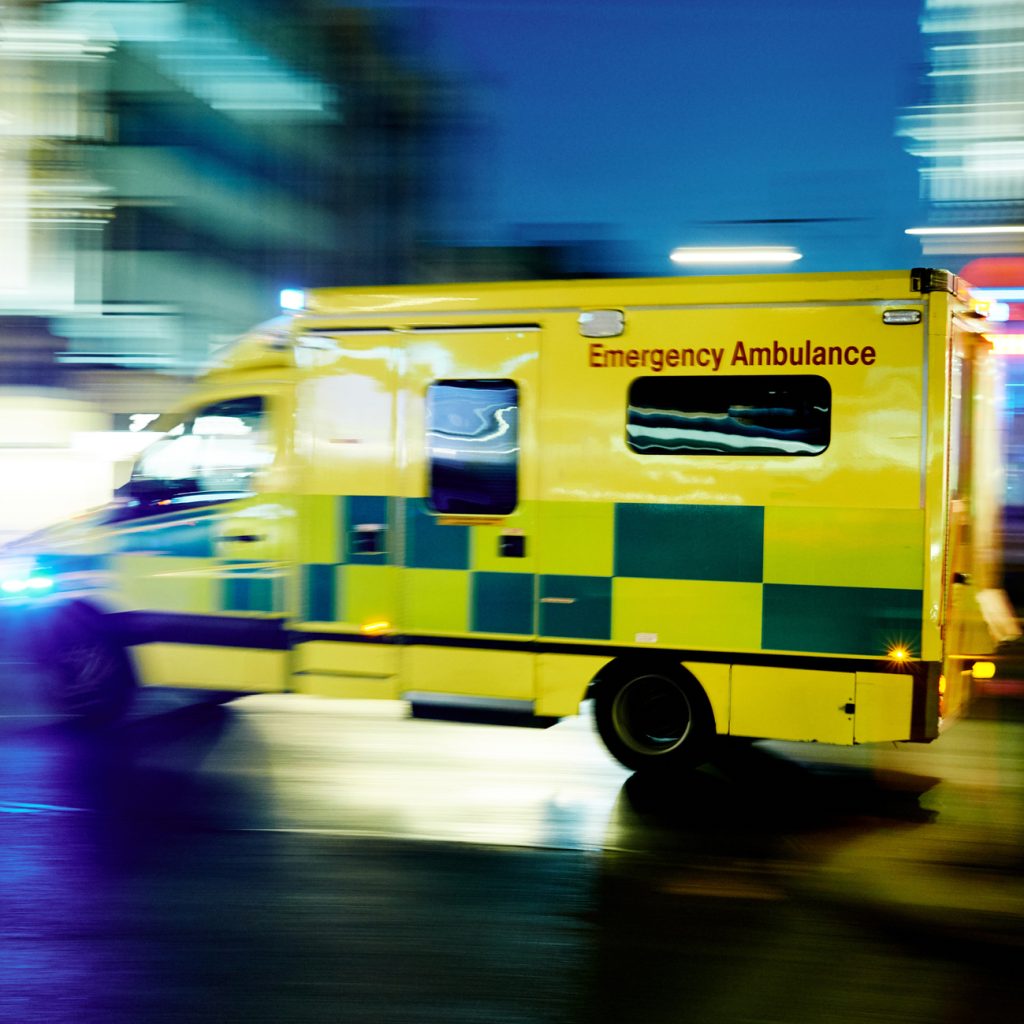Ambulance car moving at night